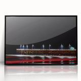 Large abstract wall art depicting Daytona scenery in muted gray and blue tones on a framed acrylic.