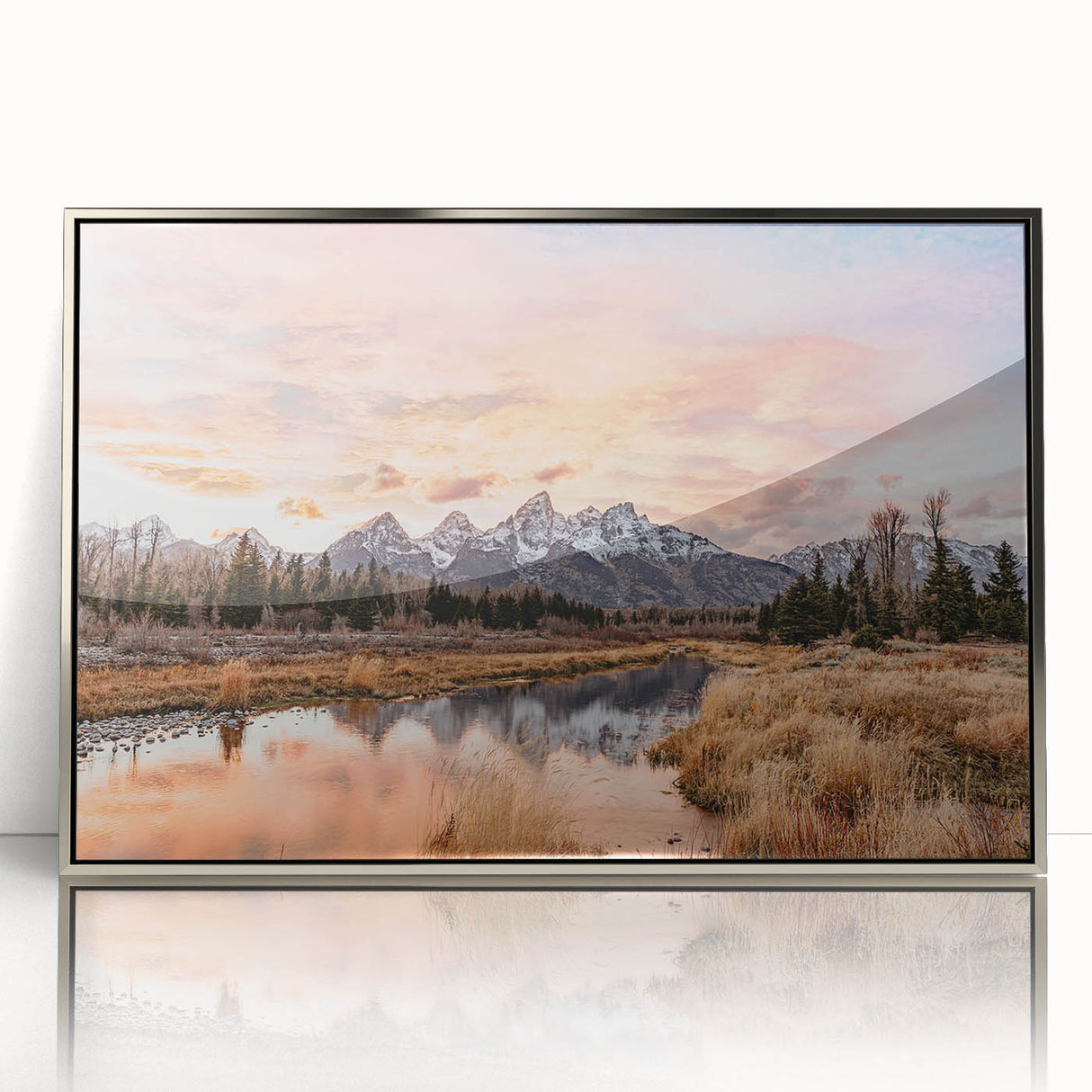 Mid-century modernist art of Grand Tetons in muted earth tones on a silver-framed acrylic.
