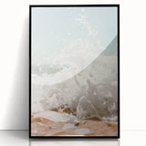 Large abstract wall art in vibrant orange and blue hues on acrylic, framed in black, suitable for modern living room decor.