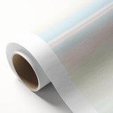 Abstract landscape artwork on rolled canvas, showcasing vibrant blues and earthy tones, elegantly packaged in a protective cardboard tube for display or gifting.