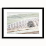 Abstract landscape artwork in a black frame with a mat, showcasing vibrant colors and dynamic shapes, perfect for modern home decor or artistic settings.