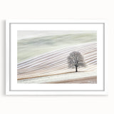 Abstract landscape framed artwork with a white mat, showcasing soft colors of blue and green, ideal for modern home decor. Perfect for enhancing living spaces.