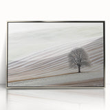 Framed abstract landscape artwork in silver acrylic, showcasing vibrant hues of blue and green with intricate textures; perfect for modern decor.