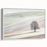 Framed abstract landscape canvas art showcasing soft earth tones and fluid shapes, perfect for modern home decor, featuring a sleek white frame for an elegant finish.