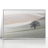 Framed acrylic artwork depicting an abstract landscape in soothing white and blue tones, designed to enhance modern decor with a contemporary artistic touch.