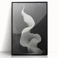 Framed abstract minimalist wall art featuring a sleek black design, showcasing geometric patterns and a modern aesthetic, perfect for contemporary decor.