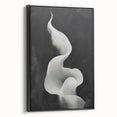 Framed minimalist wall art featuring an abstract black design on canvas, showcasing a sleek side view that highlights its modern aesthetic, perfect for contemporary decor.