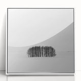 Abstract landscape artwork framed in white acrylic, showcasing vibrant hues of blue and green with textured brush strokes, perfect for modern home decor.