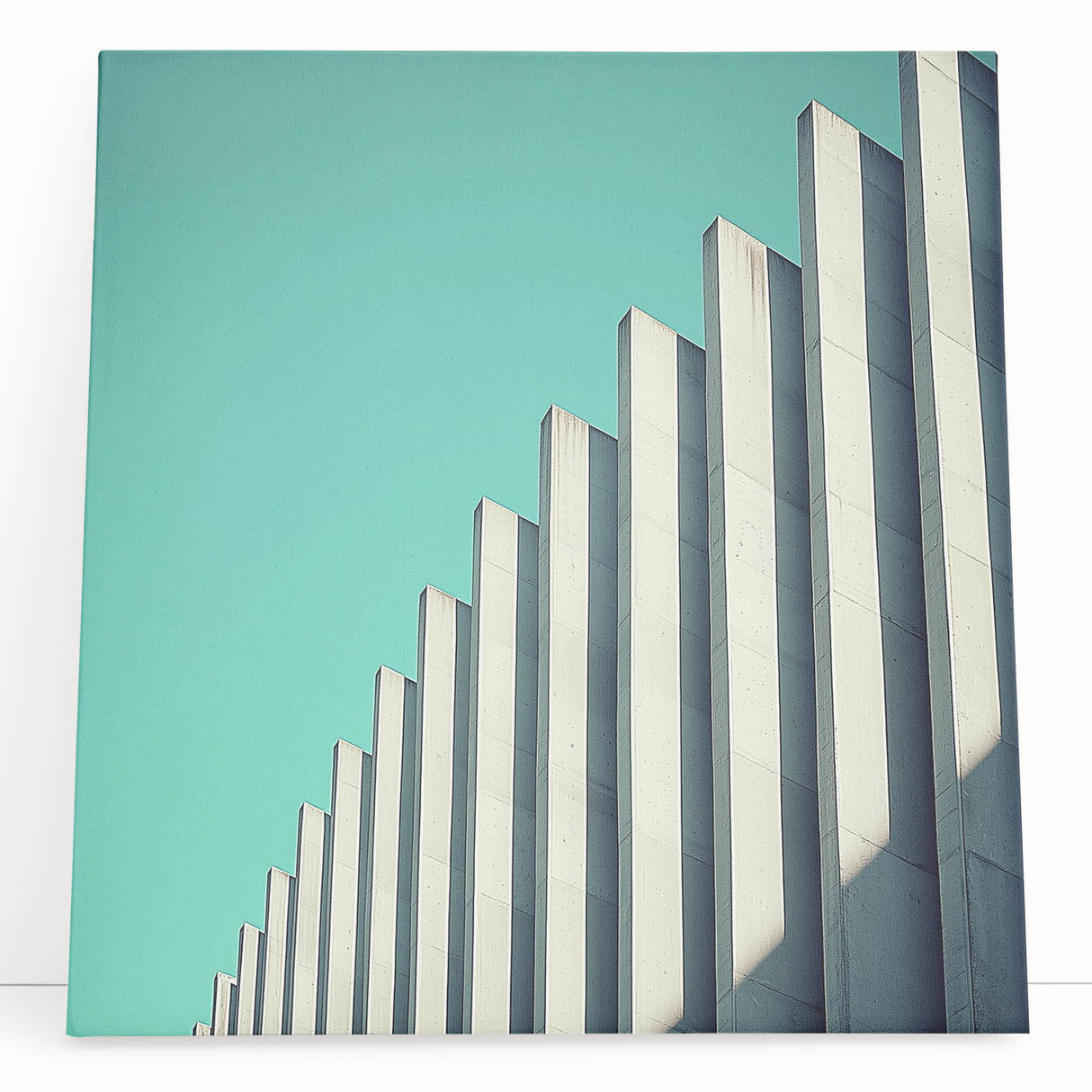 Abstract landscape stretched canvas artwork featuring vibrant colors and textured brushstrokes, leaning against a neutral wall, perfect for modern home decor.