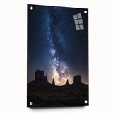 Desert landscape acrylic artwork displayed in a glass frame, showcasing vibrant colors and intricate details, perfect for modern home decor. This side view highlights the artwork's elegant pins and framing, enhancing its visual appeal.