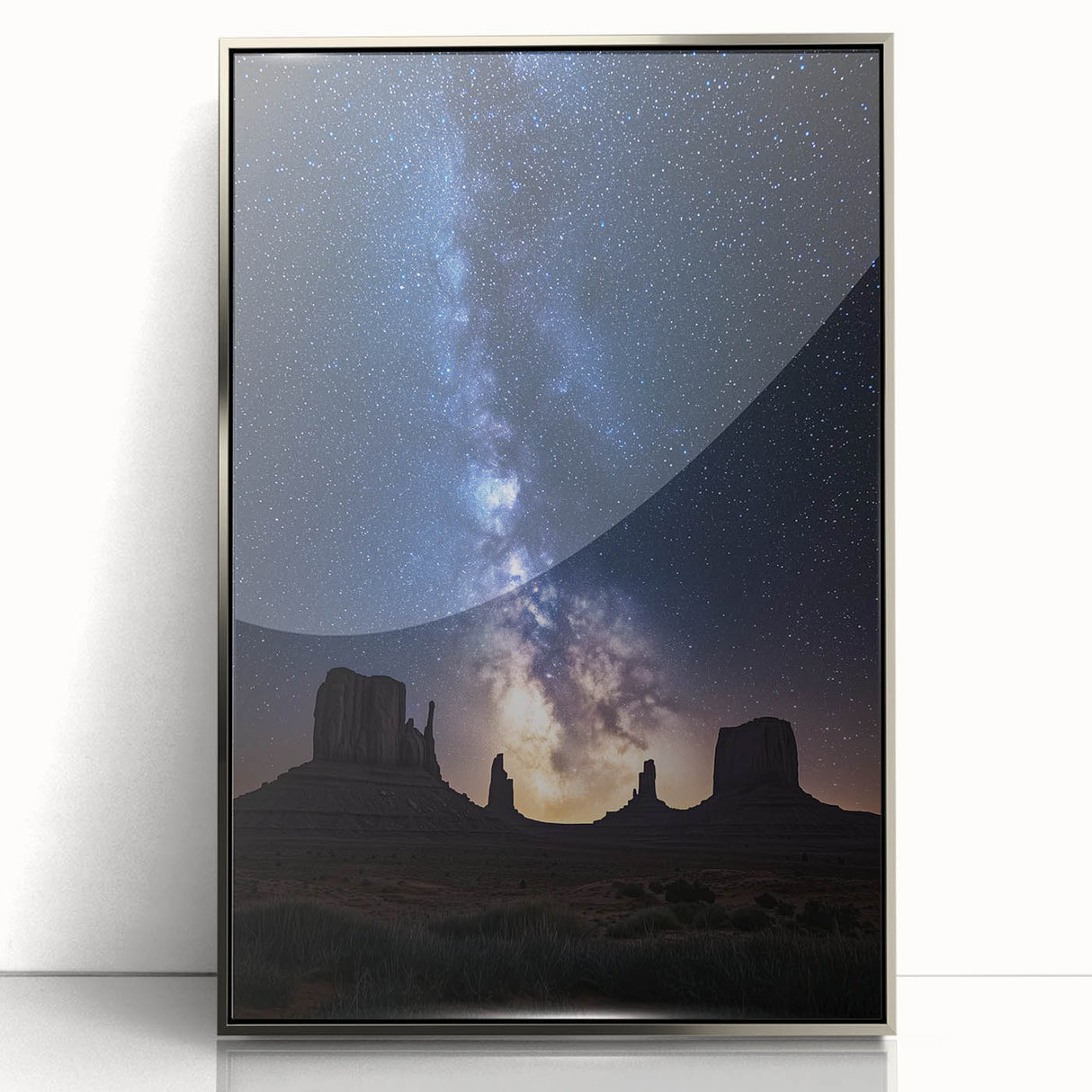 Framed acrylic artwork depicting a vibrant desert landscape with striking colors and intricate details, showcasing a silver frame that enhances its aesthetic appeal.