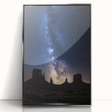 Framed acrylic artwork depicting a vibrant desert landscape with striking colors and intricate details, showcasing a silver frame that enhances its aesthetic appeal.