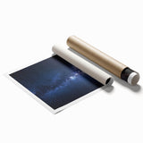 Desert landscape rolled canvas print showcasing vibrant hues of orange and brown, featuring intricate details of sand dunes and twilight skies, carefully packaged in a sturdy tube for safe shipping.
