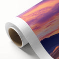 Rolled canvas artwork showcasing a serene desert landscape with golden sand dunes under a bright blue sky, designed for home décor and artistic display.