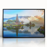 Large abstract wall art depicting a minimalist Indonesian landscape in muted earth tones, framed in black acrylic.