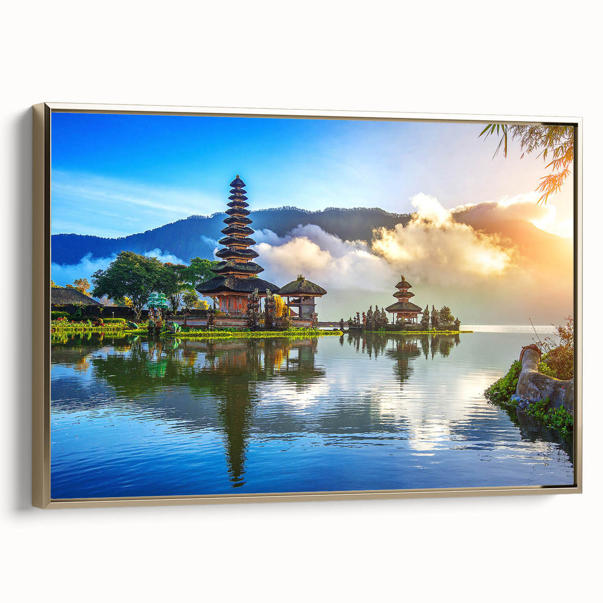 Framed canvas depicting a vintage-style Indonesian landscape in black and gold tones, ideal for bedroom wall decor.