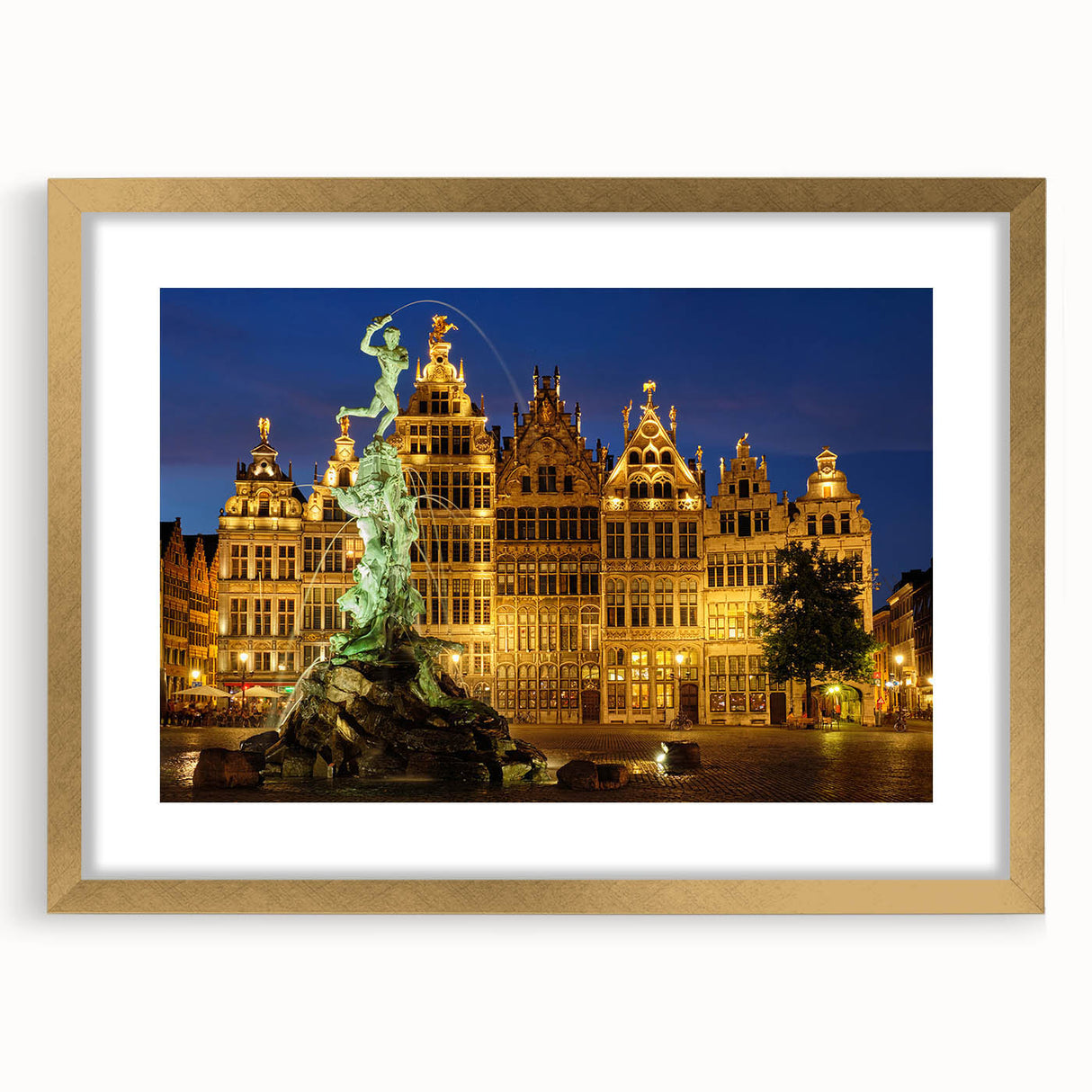 Abstract art print of a European scenery in muted gold and green tones, framed with a gold mat.