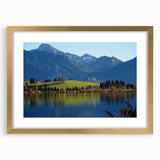 Abstract art print of a Bavarian landscape in muted earth tones on a framed gold mat, ideal for dining room decor.