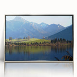 Acrylic print of a Bavarian landscape in muted green and blue tones, framed in silver, suitable for modern art wall decor.