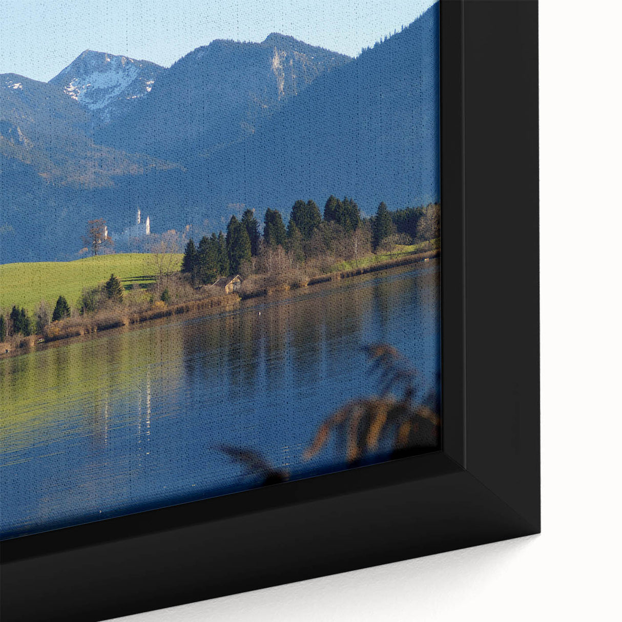 Framed canvas of a Bavarian landscape in black with colorful, textured details, ideal for large living room walls.
