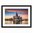 Extra large wall art of a colorful abstract print depicting a European scenery, textured on a black framed canvas.