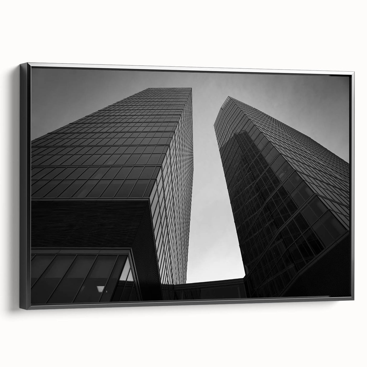 Black and white framed canvas featuring a vintage-style landscape of a European city, ideal for bedroom wall art.