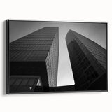 Black and white framed canvas featuring a vintage-style landscape of a European city, ideal for bedroom wall art.