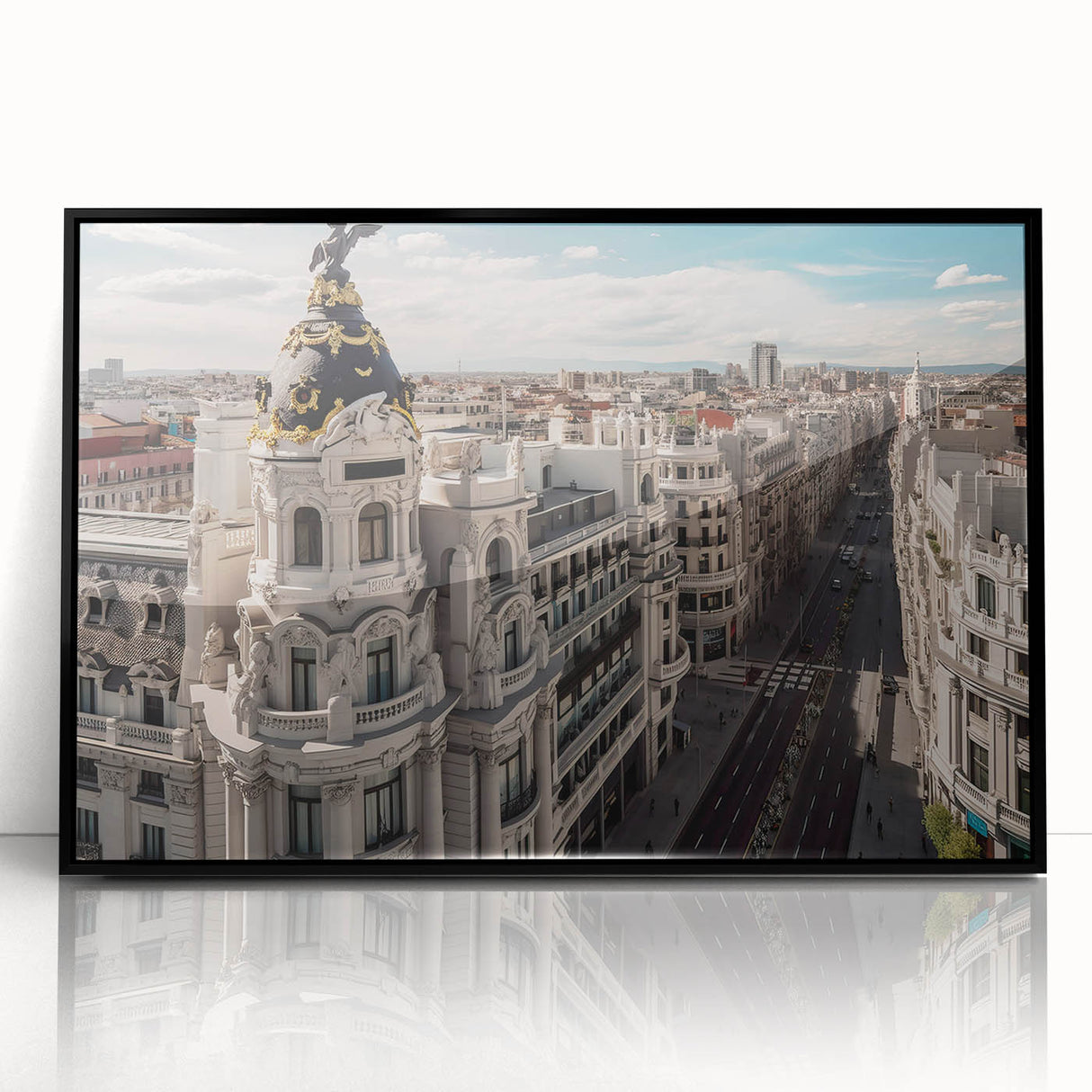 Large abstract wall art of Madrid's skyline in muted gray and blue tones on a black framed acrylic print.