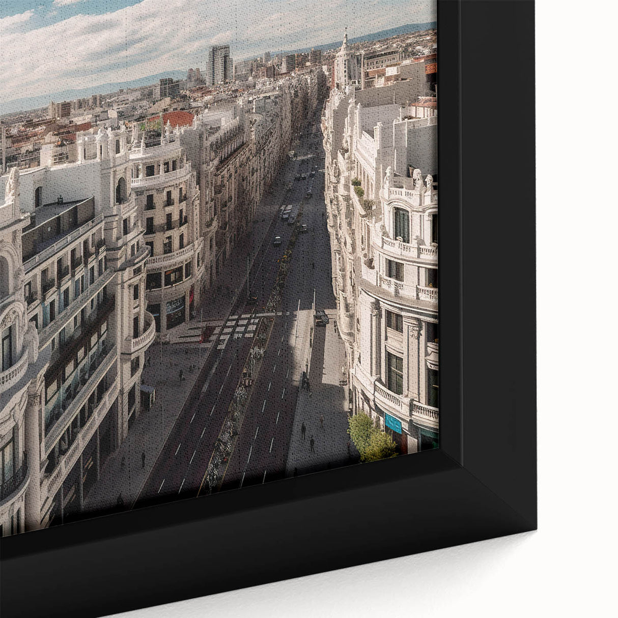 Extra large framed canvas featuring a textured depiction of the Madrid skyline in black with colorful art accents.