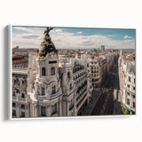 Vintage poster art of Madrid scenery in vibrant colors on a white-framed canvas, suitable for extra large living room wall.