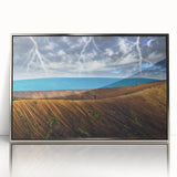 Mid-century modernist art depicting a serene European landscape in muted greens and blues, silver-framed acrylic print.