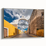 Framed canvas wall art depicting a vintage-style Yucatan landscape in muted earth tones, ideal for bedroom decor.
