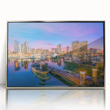 Mid-century modernist art depicting the San Diego skyline in muted blue tones on a framed acrylic print.