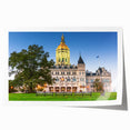 Connecticut scenery with floral elements in soft green and blue tones on a large rolled canvas.