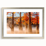 Textured art print depicting an abstract Louisiana landscape in earthy tones, framed in silver, suitable for bedroom decor.