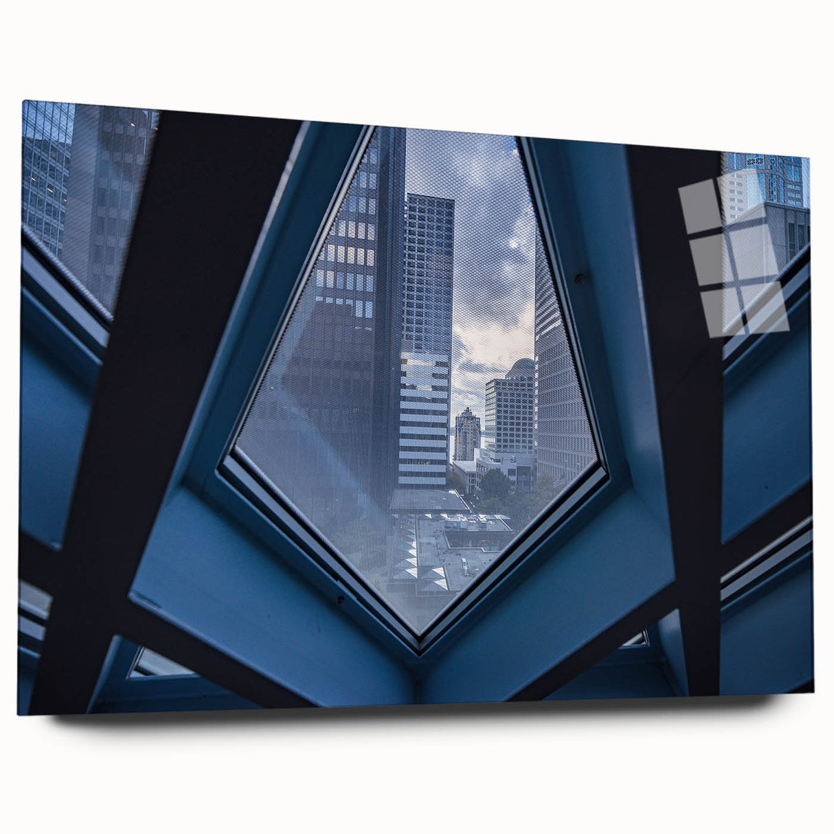 Large abstract wall art of Seattle skyline in muted gray tones on acrylic glass, suitable for bedroom or dining room decor.