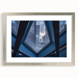 Textured abstract art print of Seattle skyline in muted gray and silver, framed with a mat, ideal for bedroom art.