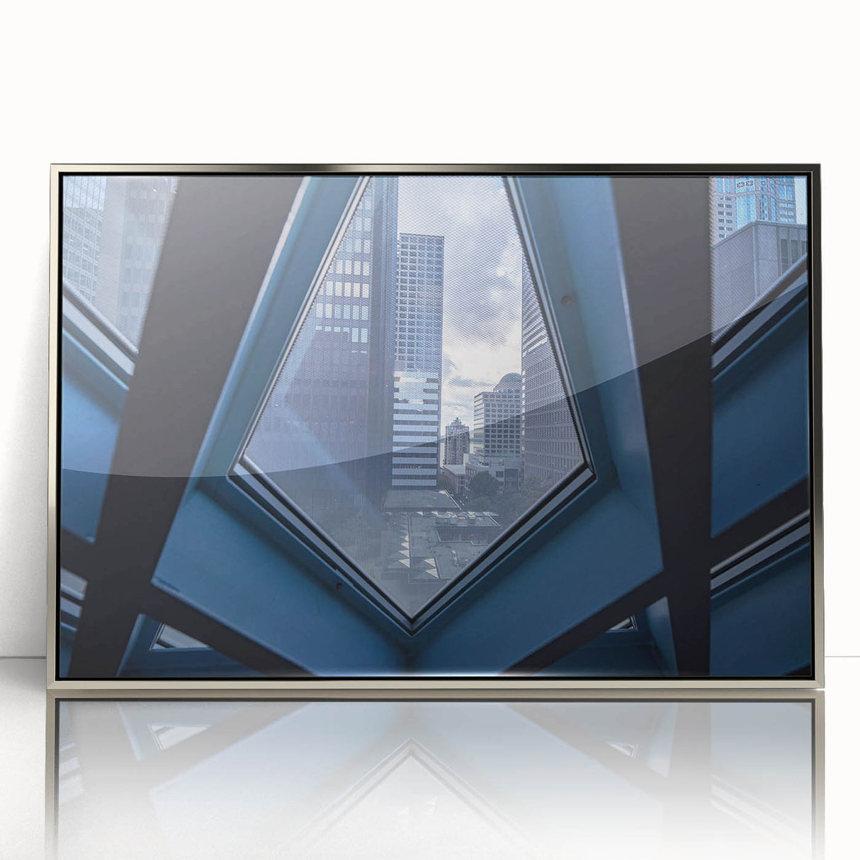 Framed acrylic print of Seattle skyline in muted gray tones, ideal for modern art wall decor.