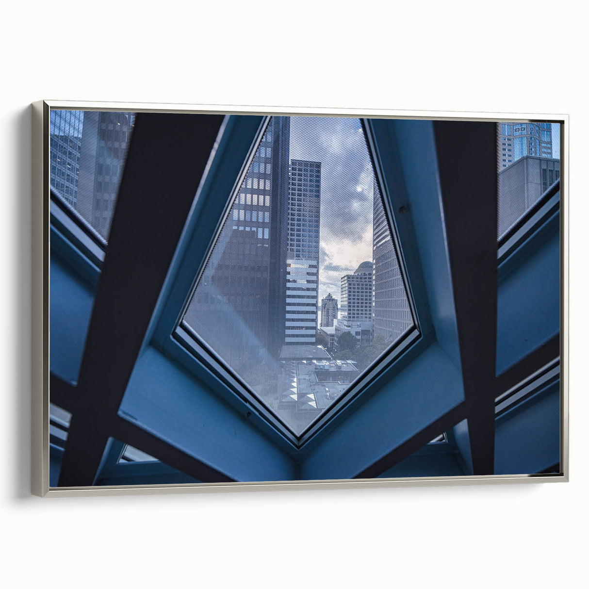 Framed canvas landscape art painting of Seattle skyline in muted gray and silver, ideal for modern office decor.