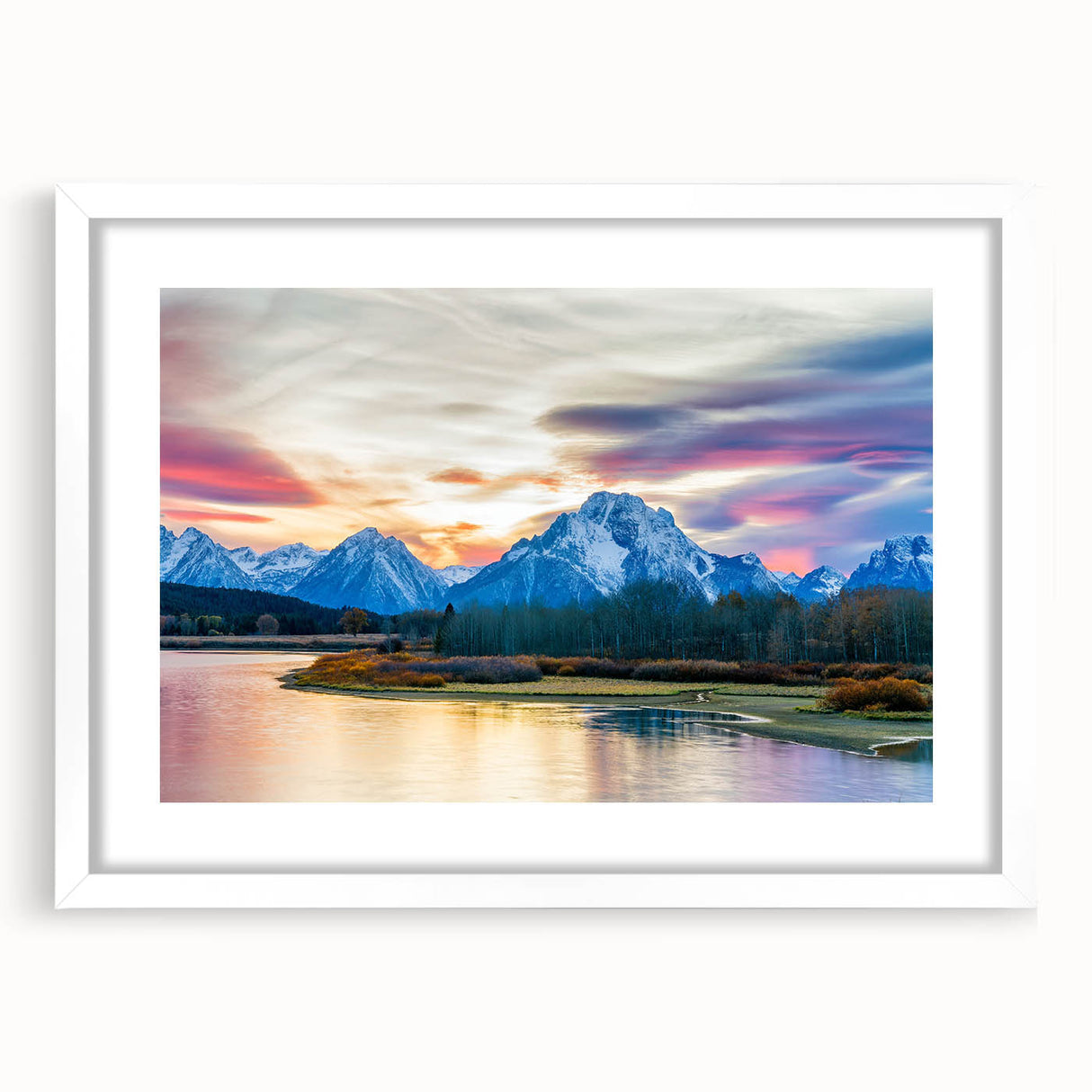 Abstract art print of the Grand Tetons in muted earth tones on a framed white mat, suitable for bedroom or dining room decor.