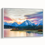 Framed canvas of a vintage poster art depicting the Grand Tetons in Wyoming, featuring a palette of earthy tones.