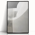 Framed abstract minimalist wall art featuring a sleek black acrylic design, showcasing geometric patterns and a modern aesthetic, perfect for contemporary home decor.