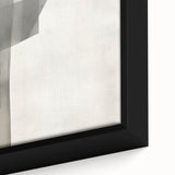 Close-up of a framed abstract minimalist wall art piece showcasing soft pastel colors and geometric shapes, enhancing modern interior decor aesthetics.