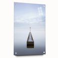 Abstract acrylic landscape artwork displayed on a glass panel, showcasing vibrant colors and intricate textures, set against a minimalist backdrop with visible mounting pins.
