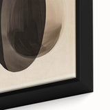 Close-up of an abstract minimalist wall art piece featuring soft pastel colors and geometric shapes, framed elegantly for modern decor in a stylish setting.