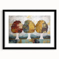 Abstract floral art print framed in black, showcasing vibrant colors and intricate details, perfect for modern home decor or gallery display.