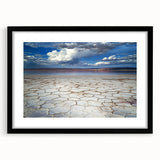 Abstract landscape art print framed in black with a white mat, showcasing vibrant colors and dynamic shapes, perfect for modern home decor.