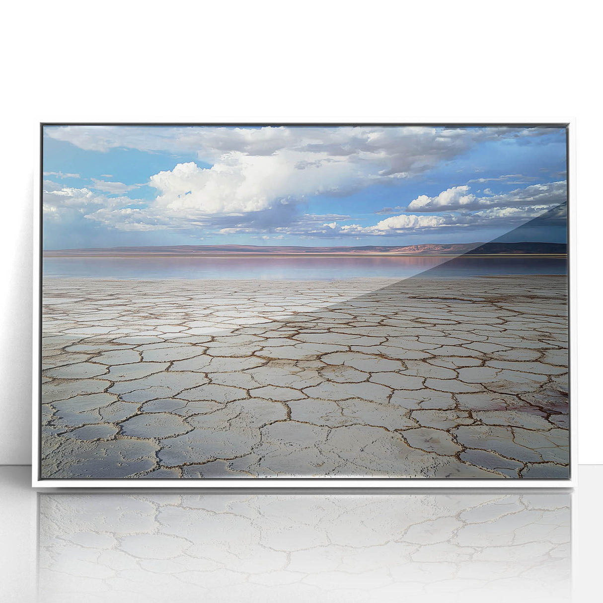 Framed acrylic artwork showcasing an abstract landscape in calming blue and green tones, set against a white frame, ideal for modern home decor.