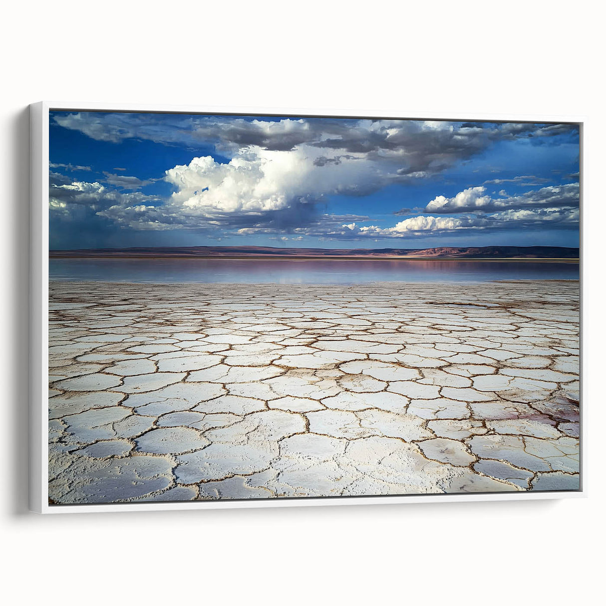 Framed abstract landscape canvas art in a white frame, showcasing vibrant colors and dynamic shapes, perfect for modern home decor accents.