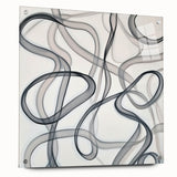 Abstract geometric acrylic glass artwork displayed from a side view, showcasing vibrant colors and sharp angles, secured with transparent pins for a modern aesthetic.